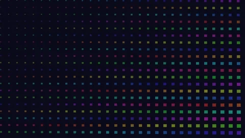 A digital grid of vibrant colored squares fading into a deep black background 库存影片 335117608