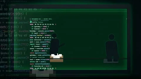 Digital hacker silhouette in front of scrolling green computer code and data on Stock-Footage 343161626
