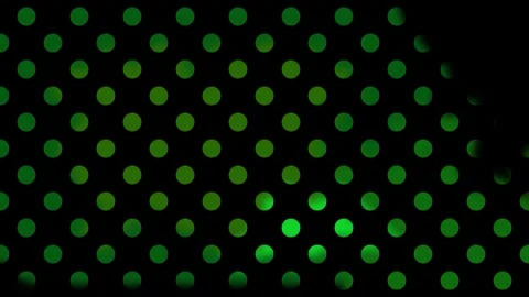 Digital halftone pattern with vibrant green dots fading into black, suitable for Video stock 326046508