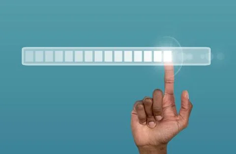 A digital hand interacts with a glowing loading bar, symbolizing technologica Stock Photos