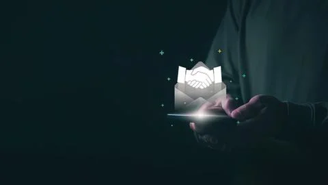 Digital handshake icon on smartphone screen Stock Photos