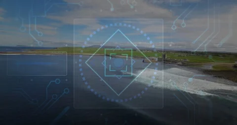 Digital HUD targeting interface hovering over coastal drone view, showing Stock Footage 307431671