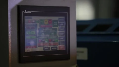 A digital Human-Machine Interface (HMI) touch screen control panel on an Stock Footage 328152583
