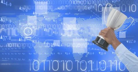 Digital image of hand holding trophy against binary code Stock Photos