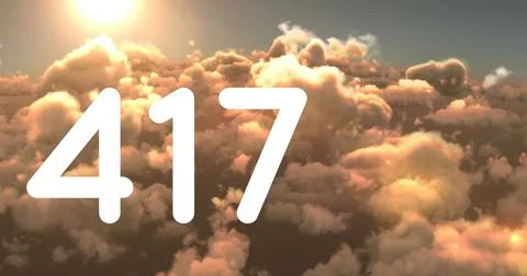 Digital image of the number displayed in bold white text over a cloudy sky 写真素材