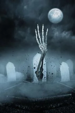 Digital image of skeleton hand at cemetery Stock Photos