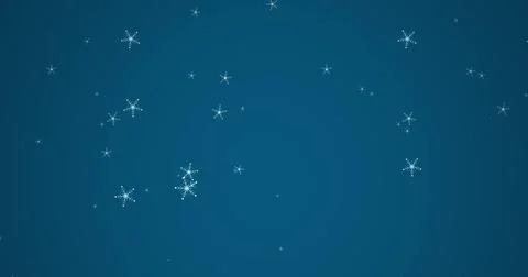 Digital image of snowflakes icons falling against copy space on blue background Illustrazione stock