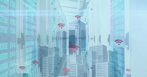Digital image of wi-fi icons over cityscape against computer server room Stock Photos