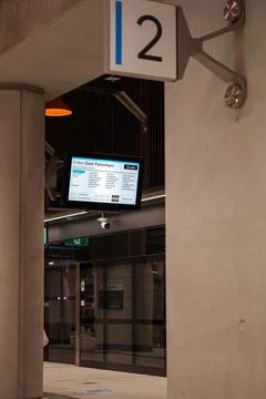 Digital Information Screen and Platform Two Signage at State Library Statio.. Stock Photos
