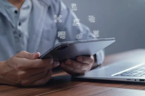 Digital Innovation Concept with Tablet and Laptop on Wooden Desk Stock Photos