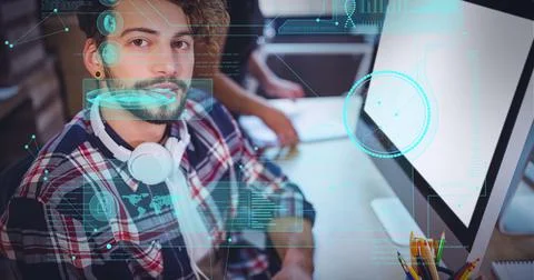 Digital interface with data processing against portrait of man sitting on his Foto stock
