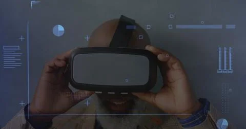Digital interface with data processing against african american senior man 스톡 사진