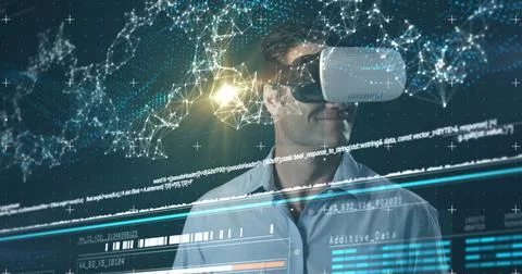 Digital interface with data processing against man wearing vr headset touching 스톡 사진