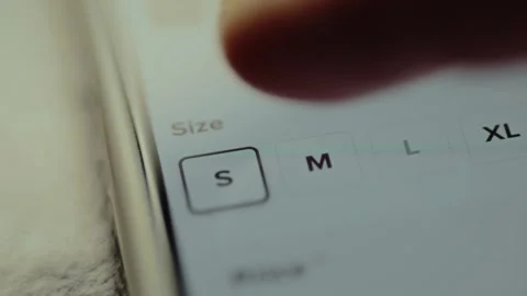 Digital interface for selecting clothing sizes from an online shopping Stock Footage 327900709