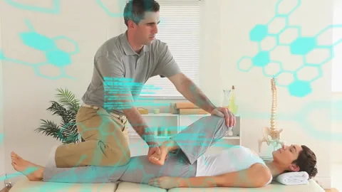 Digital interface sweeping fading and revealing therapist performing leg stretch Vidéo 310141300