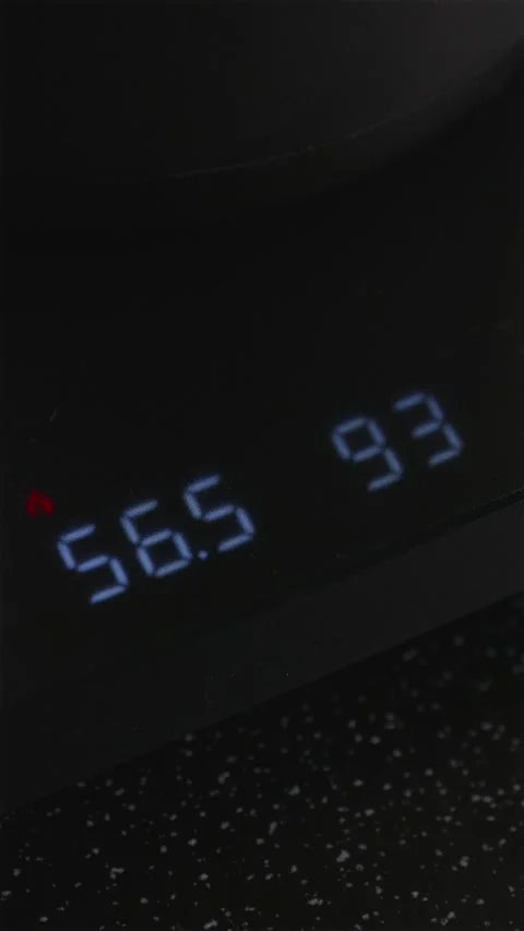Digital kettle display showing 93 degrees Celsius for brewing Stock Footage 332720159