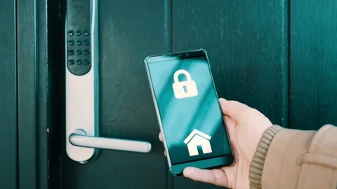 Digital key on mobile phone is used to unlock electronic lock into house Stock Footage 102159443