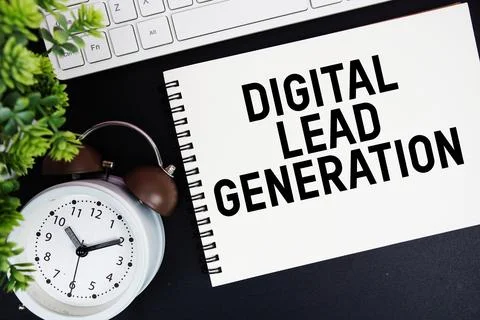 Digital Lead Generation text written on notepad with keyboard and alarm clo.. Stock Photos