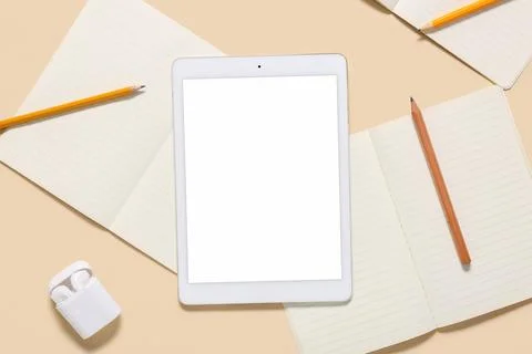 Digital learning and productivity flat lay with tablet, notebooks, pencils, a Stock Photos