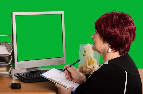 Digital Learning or Consultation, Staring at Green-Screen Monitor. Stock-Fotos