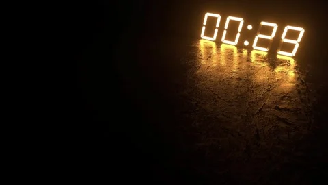 Digital LED clock countdown showing 30 seconds in glowing orange light Descripti Stock Footage 313889527