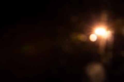 Digital lens flare in black bacground horizontal frame. Stock Photos
