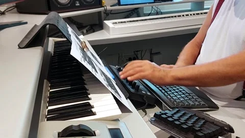 Digital music composer working in his studio Stock Footage 244847420