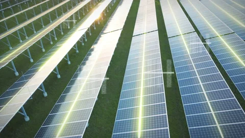 Digital network beams travel across an array of solar panels. Animated Stock Footage 142694792