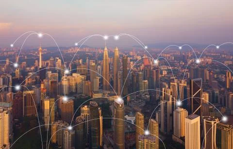 Digital network connection lines of Kuala Lumpur Downtown, Malaysia. Financia Fotos de archivo