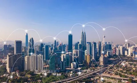 Digital network connection lines of Kuala Lumpur Downtown, Malaysia. Financia Fotos de archivo
