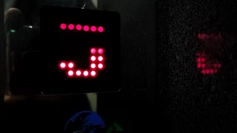 Digital No 5 blinking in dark Stock Footage 137240127