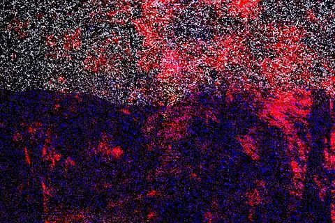 Digital noise-inspired abstract texture layered in red, purple, and black speckl Stock Photos