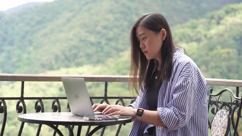 Digital nomad concept asian freelancer woman use laptop to work Stock Footage 252424940