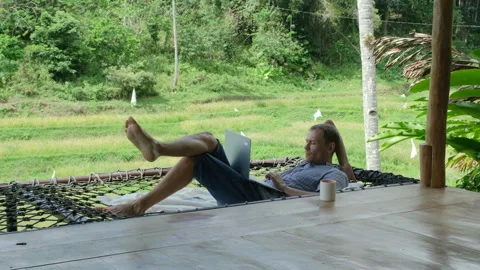 Digital nomad enjoying nature while working Stock Footage 307079767