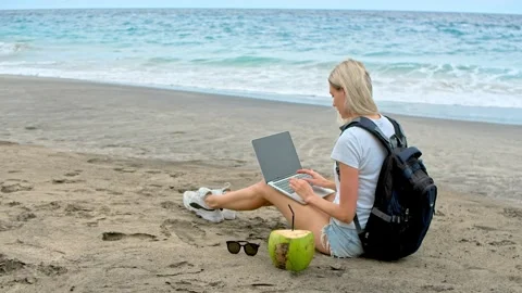 Digital nomad work sea beach. Woman use computer laptop. Distance freelance job. Stock Footage 246407305
