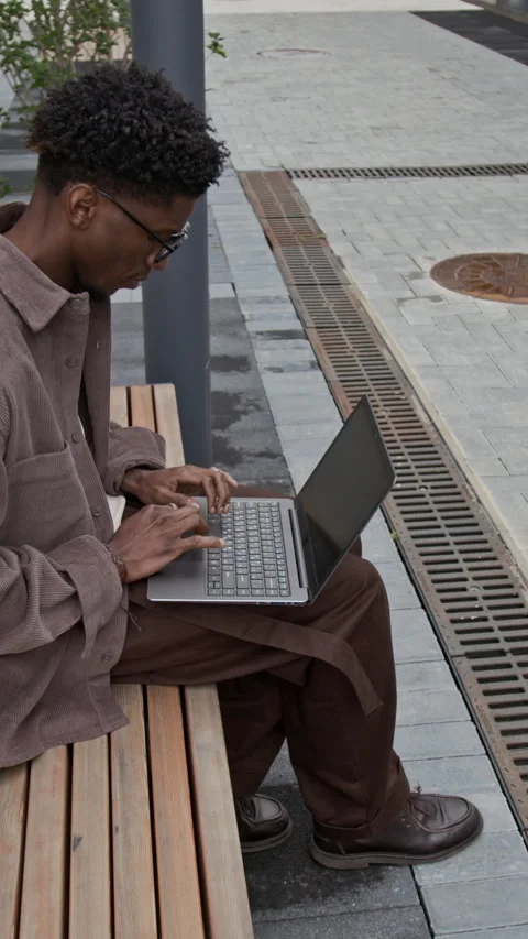 Digital Nomad Working on Bench Stock Footage 320002786