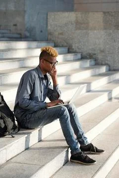 Digital nomad working on laptop Stock Photos