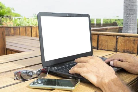 Digital nomad working on laptop Stock Photos