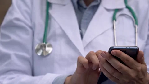 Digital Notes: A Doctor's Modern Approach to Patient Care Stock Footage 263720059