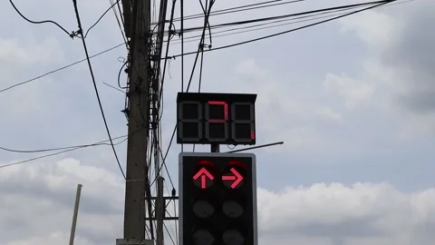 Digital numeric traffic light shows countdown red for vehicle Stock Footage 151658698