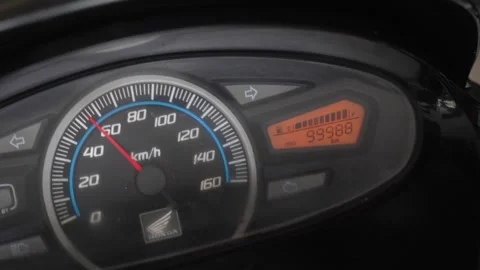 Digital odometer reading, analogue speedo displays, dashboard warnings Stock Footage 305571060