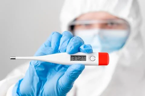 Digital or electronic thermometer with temperature 37,2 celsius degree in Stock Photos