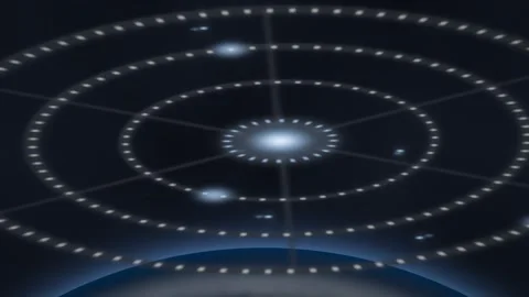 Digital orbital rings float above a dark planet Stock Footage 339678737