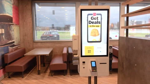 Digital ordering kiosk screen at McDonalds 4k Video stock 331835786
