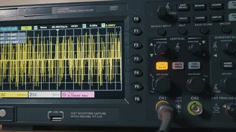 Digital Oscilloscope Screen Showing Electrical Signal Waveform in Science Lab Stock Footage 329845294