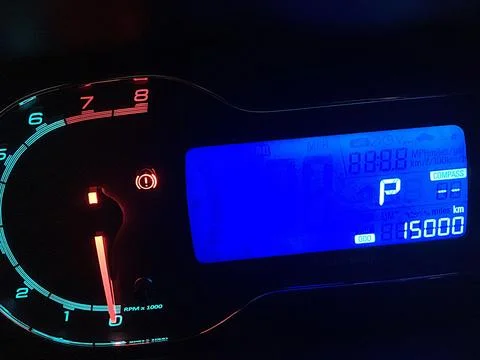 Digital panel with luminous pointer at 15,000 km Stock Photos