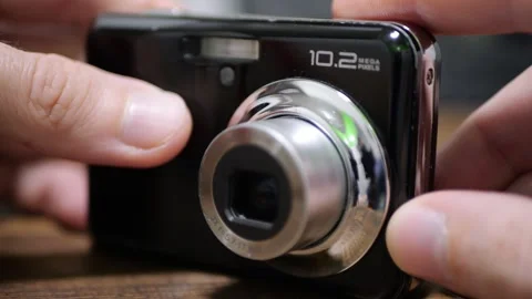 Digital Photo Camera with Built In Lens Focusing Audible Clicks for Precision Stock Footage 321527388