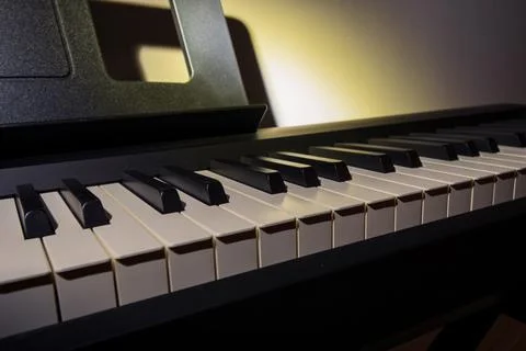 A digital piano keyboard close-up Stock Photos