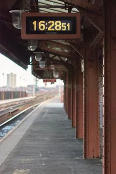 Digital platform clock showing the time 16:28 at a Chiltern Railways station, Stock Photos