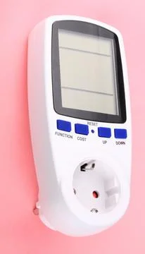 Digital Power Meter on pink background Stock Photos